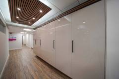 Breakroom Gloss Cabinets with Bifold Hideaway Doors