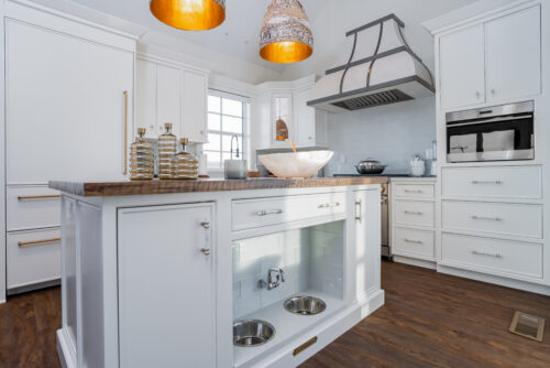 This is a picture of a white kitchen in Avalon New Jersey with custom-made cabinetry by Kountry Krafy Cabinetry.