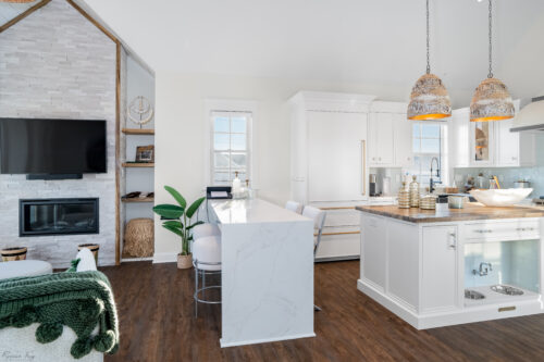 This is a picture of a bright and white kitchen made with custom cabinetry by Kountry Kraft Custom Cabinetry.