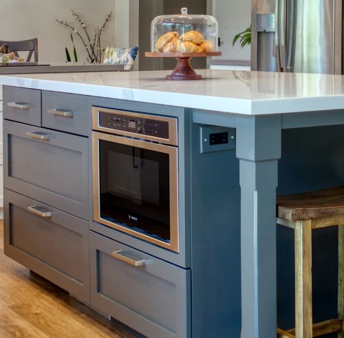 This is a picture of drawer microwave built into the island from a kitchen in Walnut Creek California