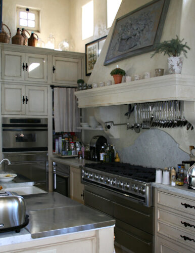 This is a picture of the dynasty cooktop range/stove in a kitchen featuring custom made cabinetry by Kountry Kraft Cabinetry. 