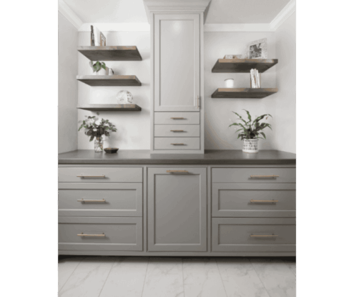 Bathrrom remodel in Lafayette California with Gray cabinets gold hardware marble floors and a valet in the hallway prior