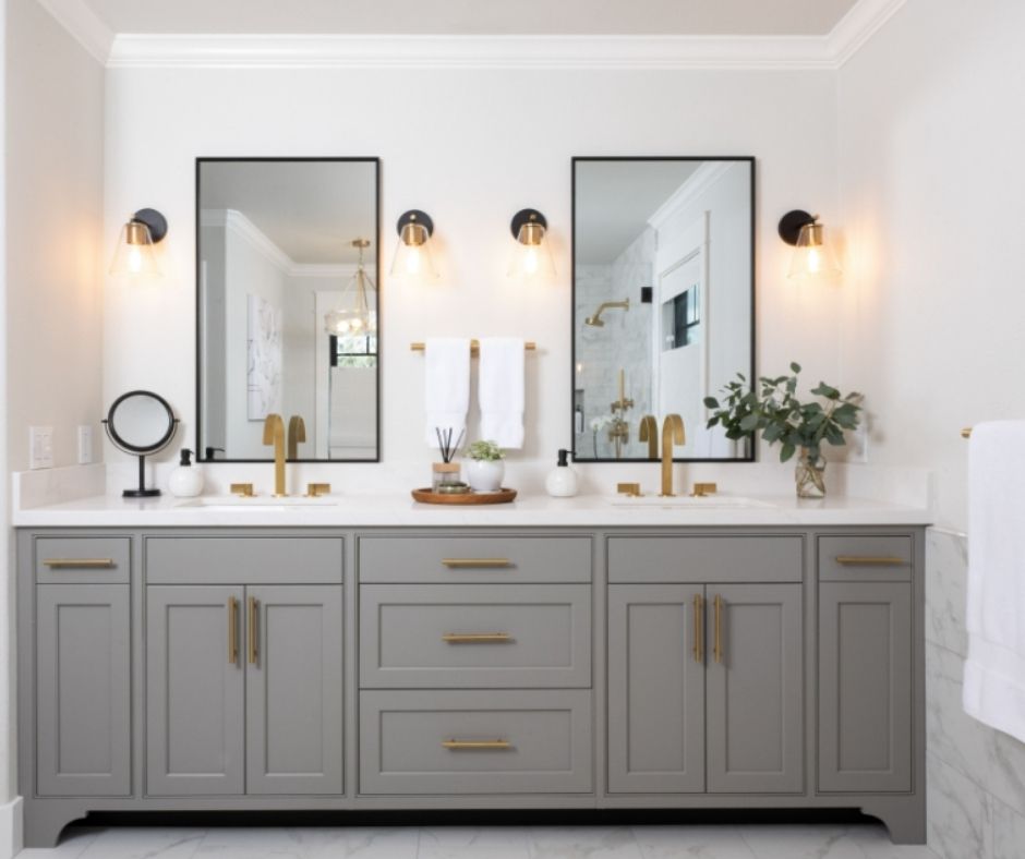 Bathrrom remodel in Lafayette California with Gray cabinets gold hardware marble floors and a valet in the hallway prior