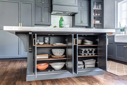 Close up view of kitchen island with open cabinet doors Summit, NJ