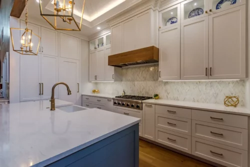 Kitchen cabinets that sit on top of the cabinet frame for a seamless look. 