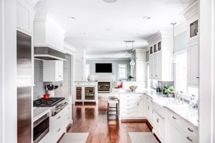 Full view of kitchen featuring refrigerator, oven, range, and hard maple cabinets Madison, New Jersey