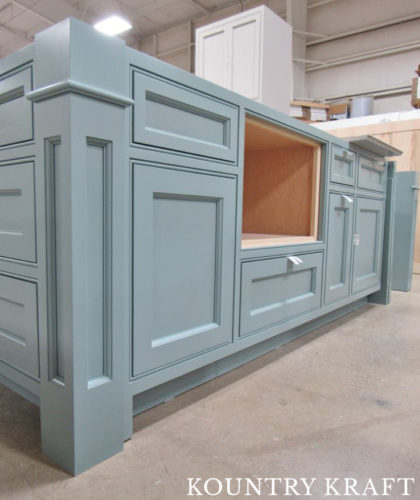 A Multitude of Designs Run Through the Kountry Kraft Shop Featuring Custom Cabinet Colors