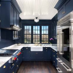 Blue kitchen in Haddam, Connecticut with wolf range, cove dishwasher