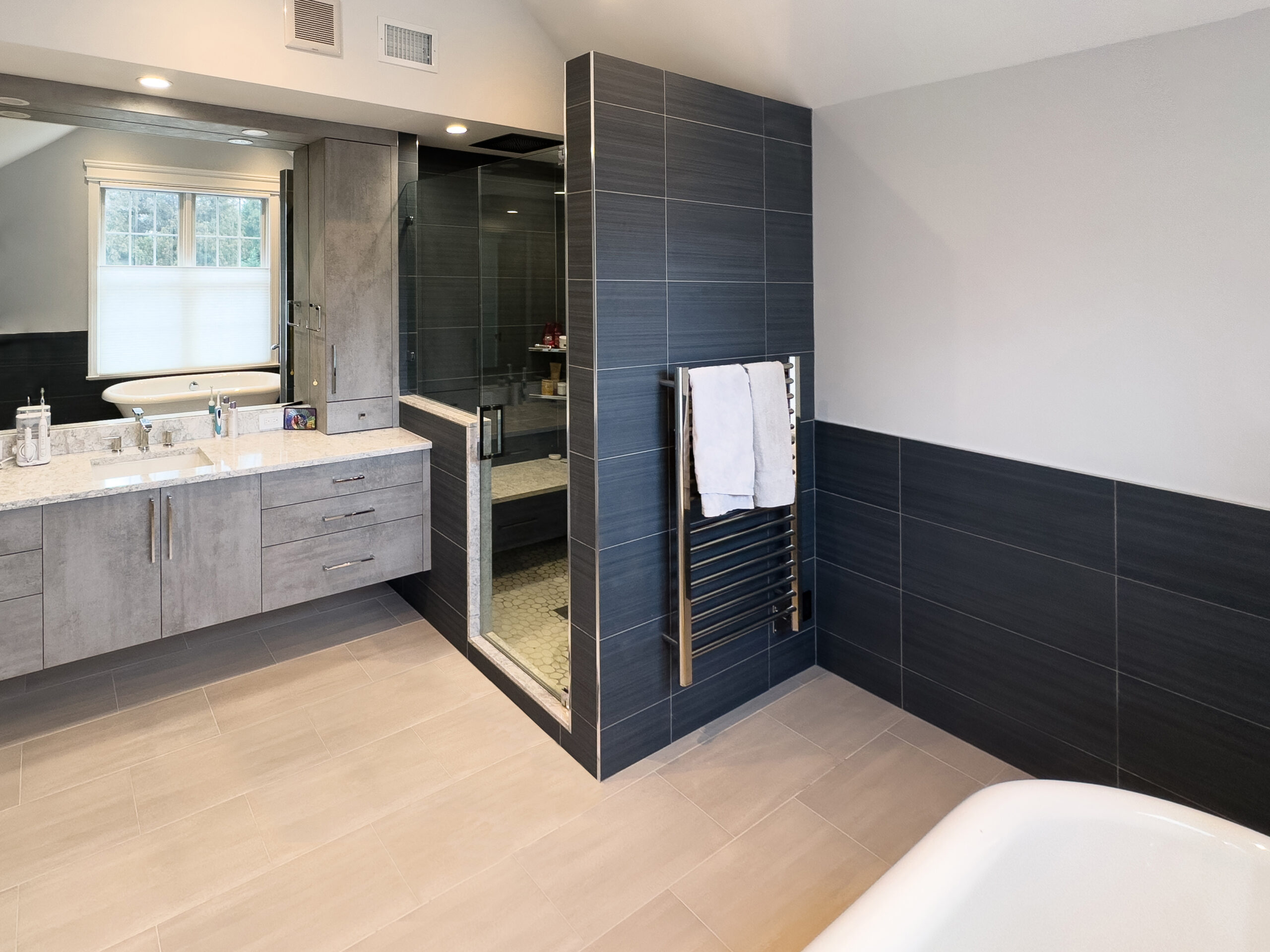 This is a picture of an open bathroom in Nesconset New York with custom cabinets by Kountry Kraft Cabinetry.