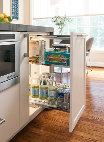 Kitchen Island with a Base Pull Out to Create Maximum Storage for all Size Products