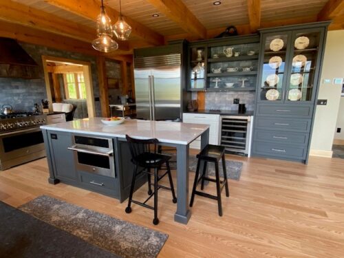 Kitchen-and-Bath Remodel-in-White Mountains- New Hampshire kitchen with island and seating and wood floor