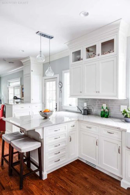 Kitchen with white hard maple and glass panel cabinet doors Madison, New Jersey