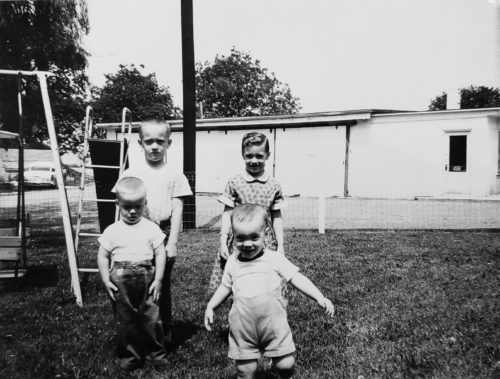 The Hurst Kids in Front of the Kountry Kraft Garage Where a Dream Became a Reality