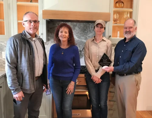 Todd Perkins, Kountry Kraft Sales Rep; Beth Veillette; Allison Hanford; and Roger Yiengst, Sales Manager at Kountry Kraft