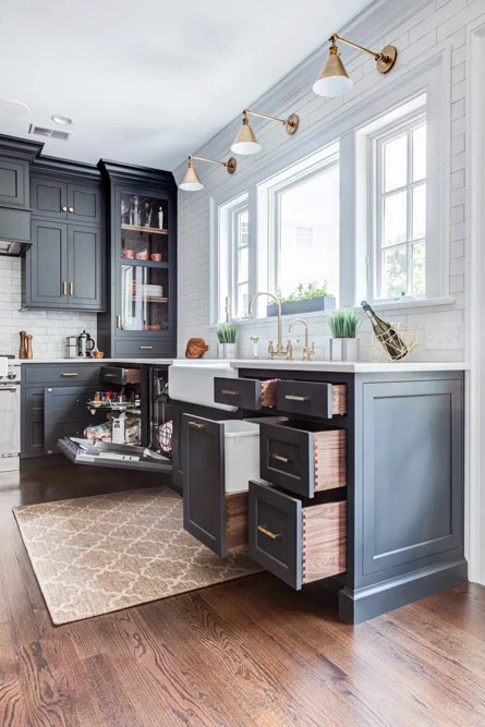 L-shaped counter with farmhouse sink and open cabinets Summit, NJ