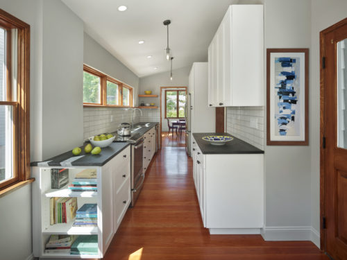 This Small Kitchen Features a Galley Layout that Provides an Efficient Work Space