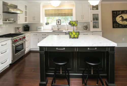Dark and light Kountry Kraft cabinetry with kitchen design by Stonington Cabinetry
