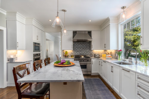 U Shaped Kitchen Layout Creating an Effective Work Triangle in a Transitional Farmhouse Kitchen 