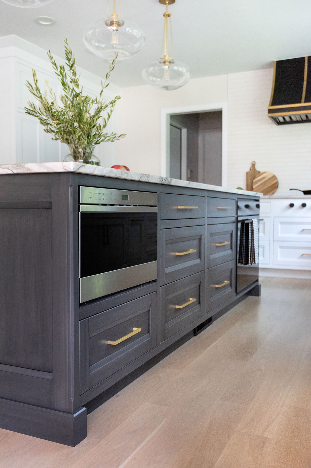 24” Wolf  Transitional Drawer Microwave built into kitchen island.