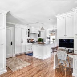 Alpine White Cabinetry for an open concept kitchen, office and dining area in Summit, New Jersey
