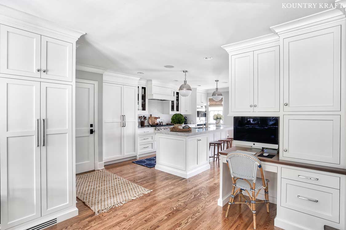 Alpine White Cabinetry for an open concept kitchen, office and dining area in Summit, New Jersey