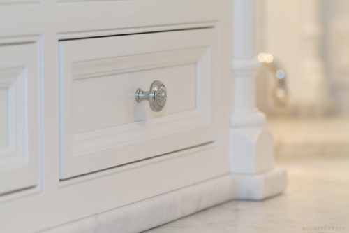 Hardware detail on drawer of white bathroom cabinets North Haledon, NJ