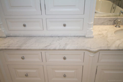 Close up of drawers and white bathroom cabinets North Haledon, NJ