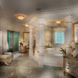 Elegant bathroom colored white and gold with pillars around the bathtub Chester Springs, PA