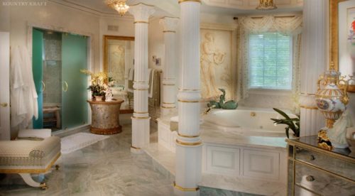 Custom bathtub cabinetry in Chester Springs, PA featuring white pillars with gold trim
