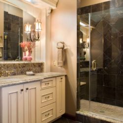 Traditional style bathroom with vanity cabinetry and shower with glass door Baltimore, MD