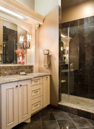 Traditional style bathroom with vanity cabinetry and shower with glass door Baltimore, MD