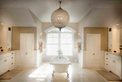 Master bath featuring small bathtub in large open space Bethesda, MD