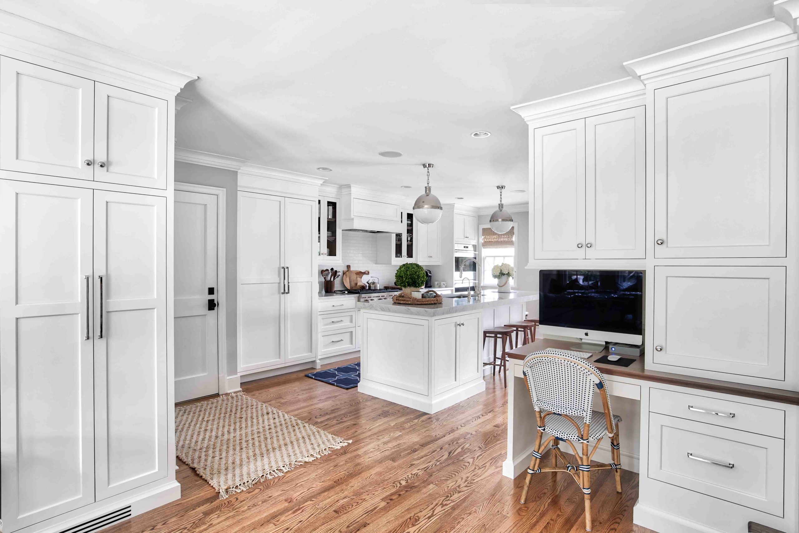 White Kitchen with a Built-In Kitchen Desk Area