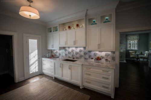 White cabinetry and counter with sink Laurel Hollow, NY