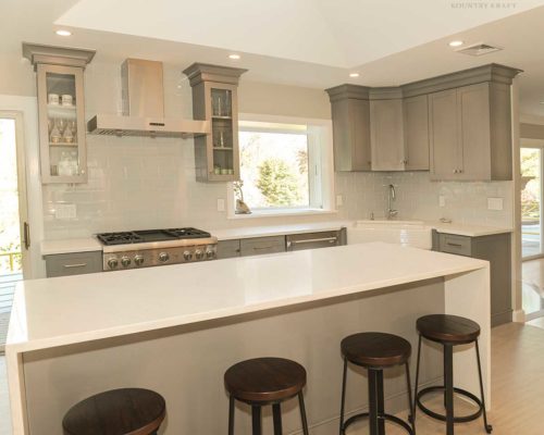 Cinder cabinets, range, and island with stools Wyckoff, NJ