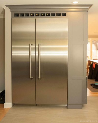 Cinder maple cabinets and close up of refrigerator Wyckoff, NJ