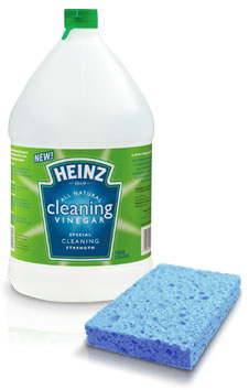 cleaning with white vinegar is safe and inexpensive and can be the best way to clean wood kitchen cabinets