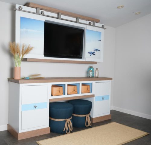 Entertaining center with shelving for tv and storage cabinets