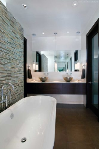 Contemporary bathroom with a freestanding bathtub and vessel sinks Norcross, GA