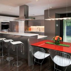 Contemporary kitchen with multilevel island and red table Norcross, GA