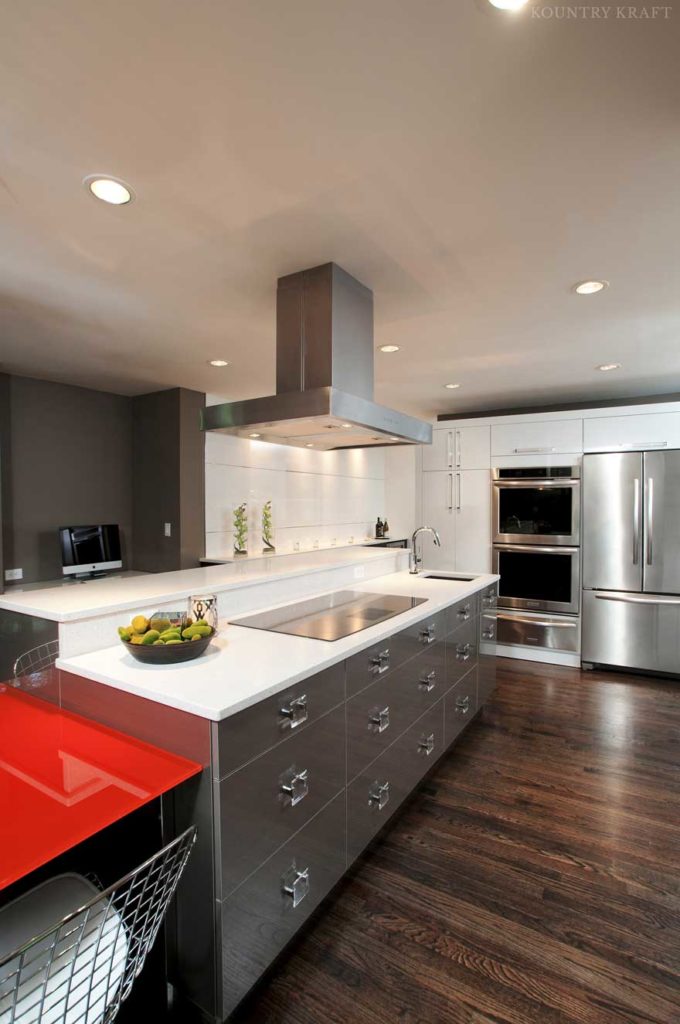 Multilevel island with sink and cooktop in contemporary kitchen Norcross, GA