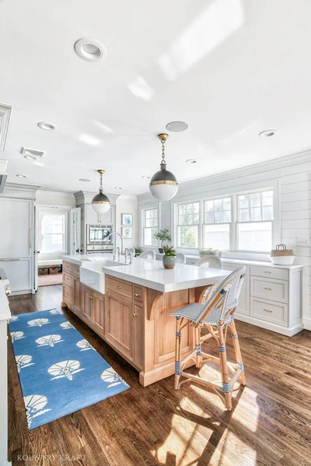 Custom White Oak Kitchen Island with Brass Hardware and Pendant Lights in Chatham, New Jersey