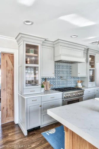 Coventry Gray Kitchen Cabinets and Blue Pattern Tile Backsplash in Chatham, New Jersey