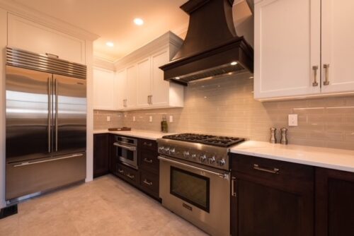 custom cherry and white cabinets