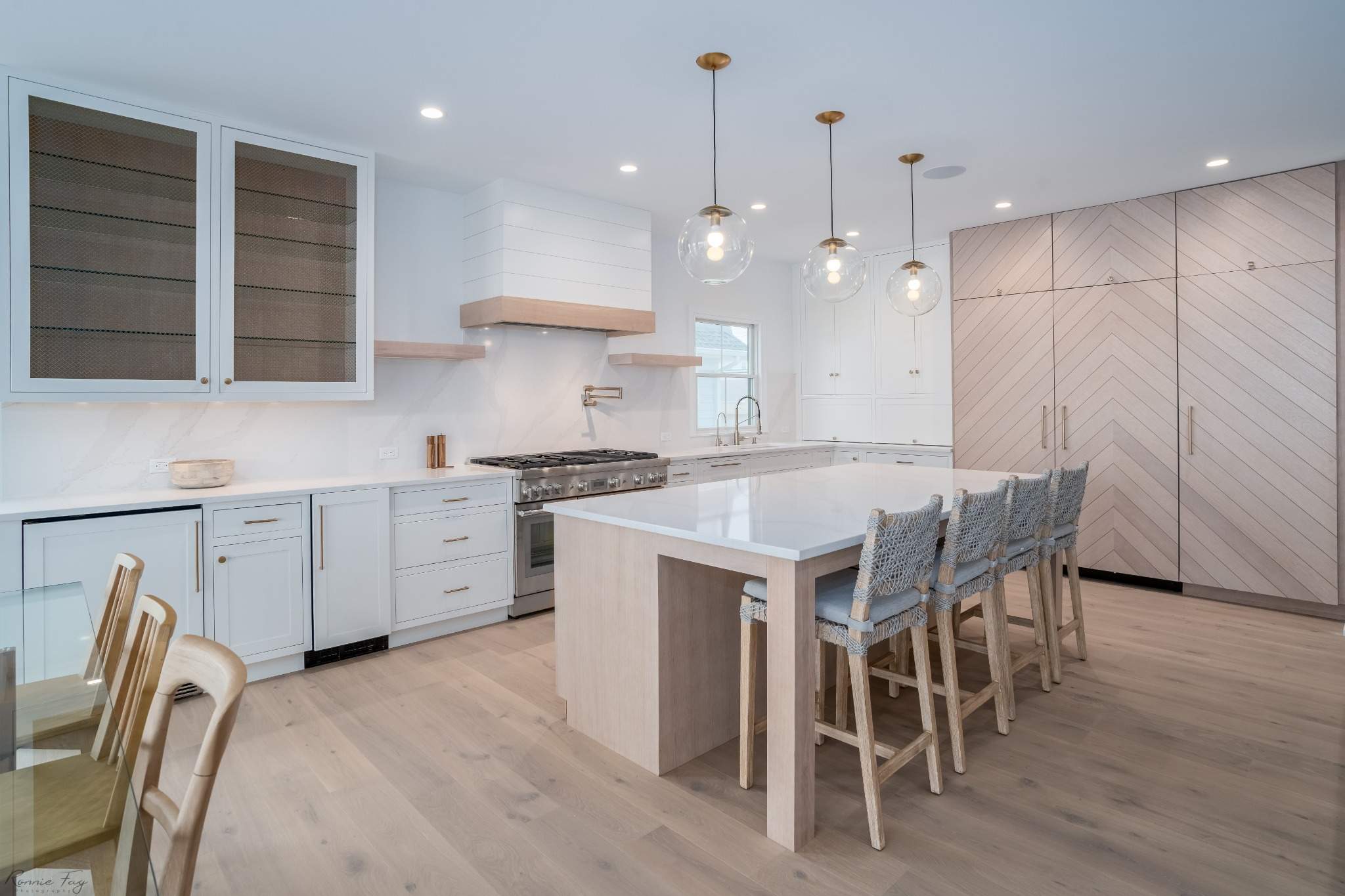 Full Avalon NJ kitchen remodel showcasing custom cabinetry by Kountry Kraft, quartz island, Thermador appliances, and brass fixtures.