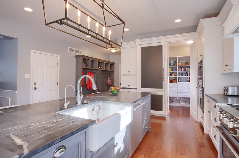 Walk-In Pantry with Custom Cabinets by Kountry Kraft