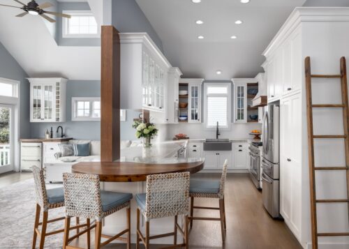 Custom white kitchen remodel Avalon NJ with Kountry Kraft cabinetry, hickory accents, and a wet bar designed for coastal living.