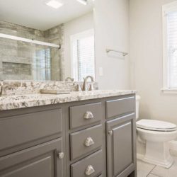 Gray bathroom cabinets with marble top and sink Wyomissing, PA