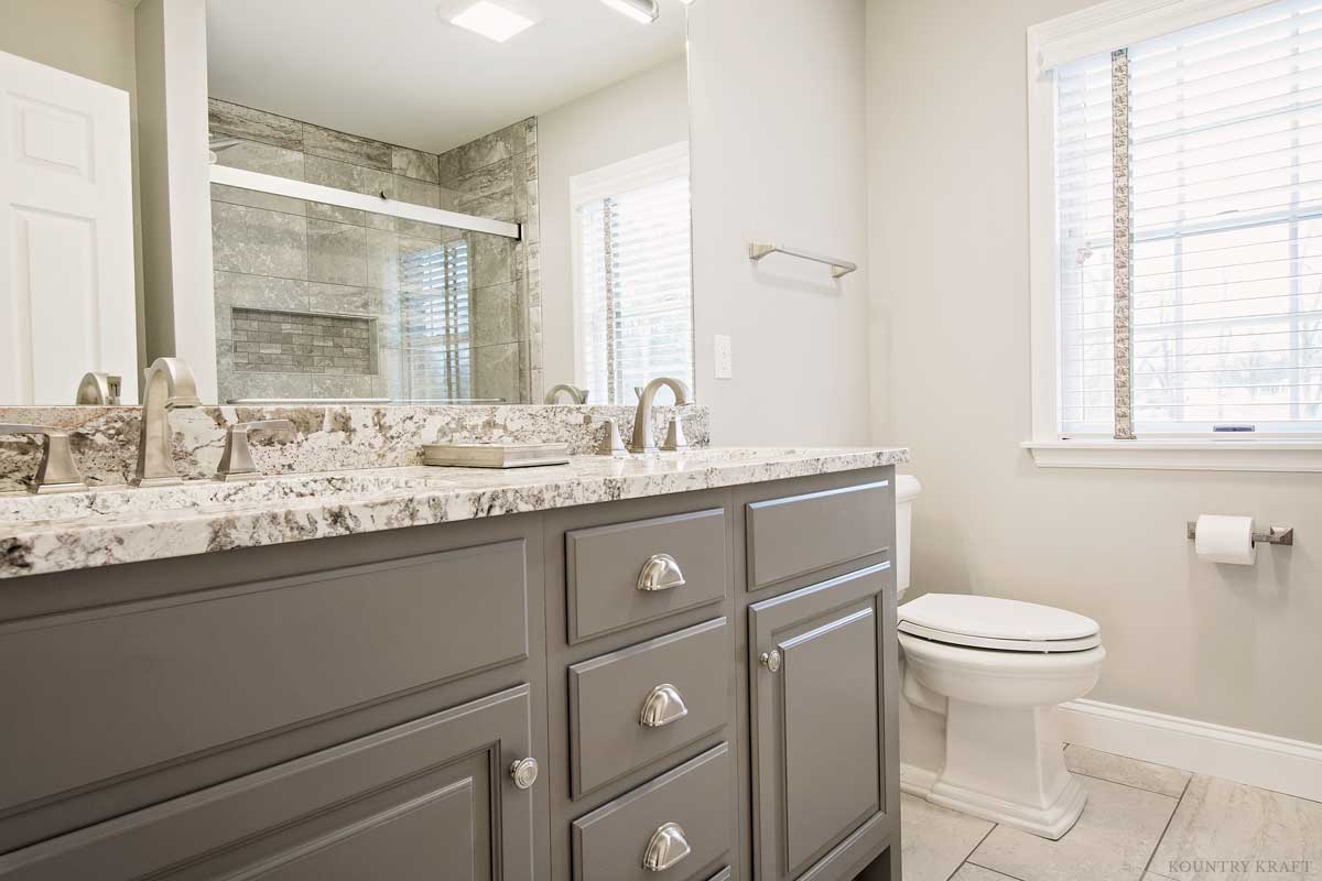 Gray bathroom cabinets with marble top and sink Wyomissing, PA