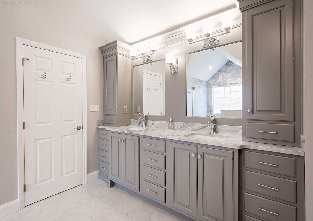 Bathroom with custom gray cabinets and dual sinks with a mirror each Wyomissing, PA